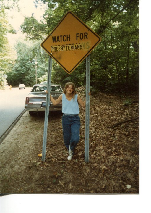 Sue Elseth under sign on Perryman